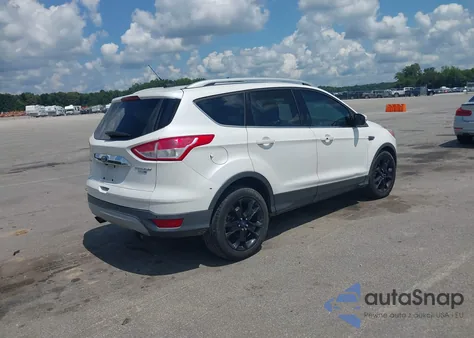 2015 Ford Escape Titanium z USA, uszkodzony, nr VIN 1FMCU9J91FUB03444